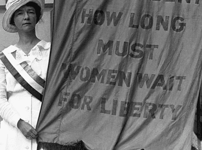 Suffragette protesting in front of the White House.